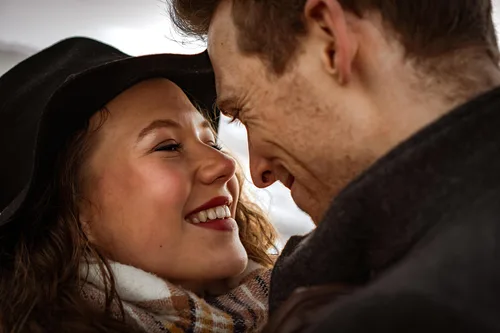 a passionate look shared between a man and his future wife during a love shoot