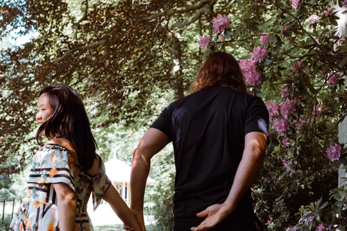 a couple dancing and having fun in Elswout forest